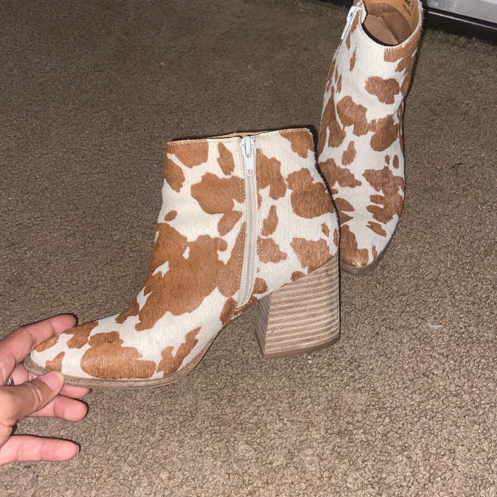Platform cow print shoes